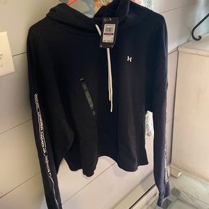 Under armour hoodie. Slightly cropped (but not super short)